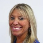 A person in a blue shirt Description automatically generated